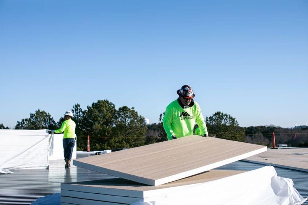 Commercial roofer moving materials