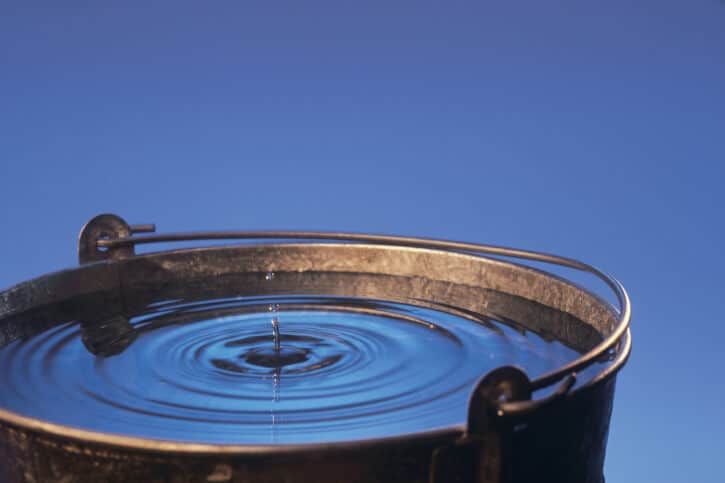 roof leaks, Water dropping into bucket