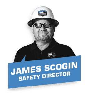 James Scogin, Mid-South Roof Systems' Safety Director wearing sunglasses and a hard hat