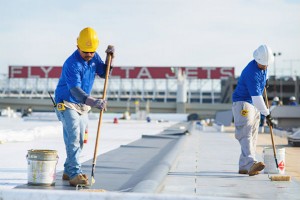 Mid-South Roof systems team members atop Delta rooftop working on roof lifespan
