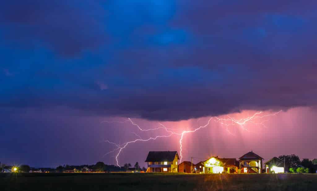 This is a picture of a storm above my village. There were rain and thunder all around me, and above me, there was a clear sky full of stars. .It was amazing, so after an hour of shooting, I captured this moment. You can see it's raining, and thunder is coming out from the same cloud at the same time.